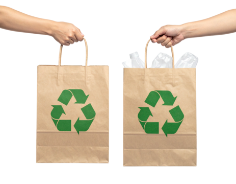 Two brown paper bags, one empty, the other filled with various plastics, both featuring a recycling symbol