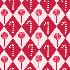 Cute Christmas candy cane and sticks on red and white diamond shapes seamless pattern. For wrapping paper, greeting cards and fabric.