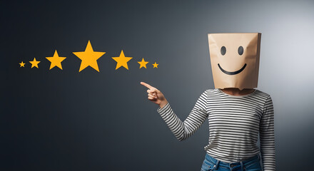 Customer Experience Concept. Woman Covered her head by Paper Bag with Happy Feeling Face and Pointing Hand to Five Star Services Rating Satisfaction. Client's Feedback and Online Review