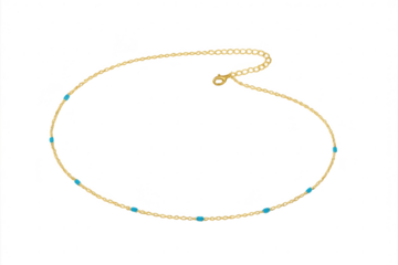 Elegant golden chain necklace with blue beads isolated on transparent background