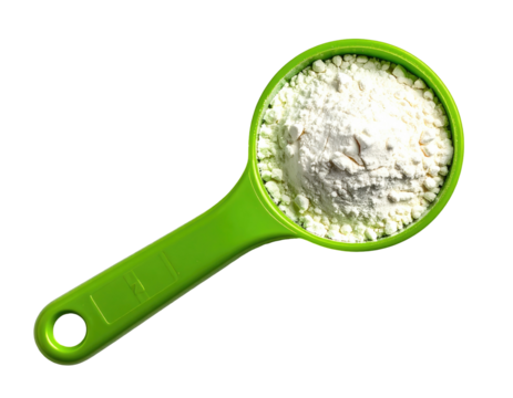 Green measuring cup filled with white flour