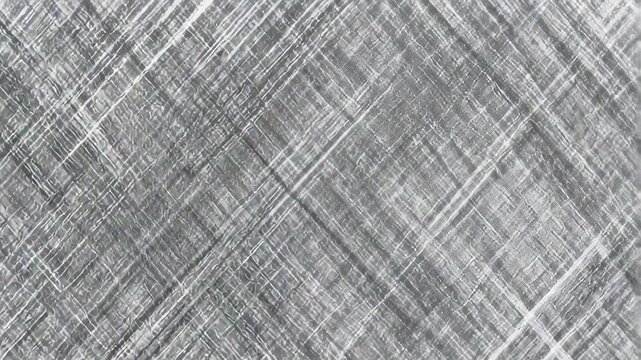 Crosshatched gray texture remaining fixed on frame, displaying uniform diagonal lines