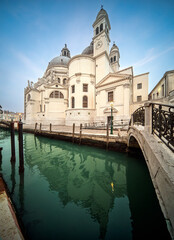 Fototapeta premium Santa Maria della Salute reflected in Rio della Salute in Venice