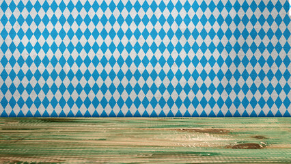 Top view of a blue checkered tablecloth or napkin with a wooden table background. Copy space. Concept of Oktoberfest. Bavarian German culture festival decoration symbol