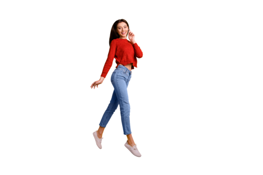 Full length photo of positive cheerful satisfied girl jump have free time with her friends go walk enjoy autumn holidays wear trend outfit isolated over yellow color background