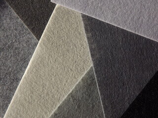 The textured surface is gray as a background. Felt. High quality photo