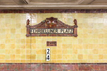 signage Fehrberliner Platz - engl. square of Fehrberlin  -  at the metro station in Berlin