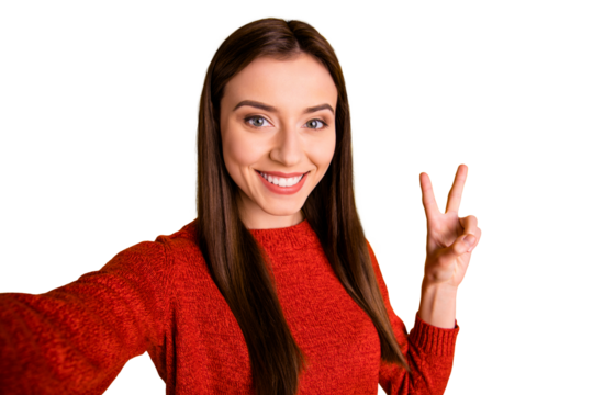 Close up photo of positive cheerful lovely girl have fun on holidays vacation take selfie make v-sign wear red pullover good looking outfit isolated over yellow color background