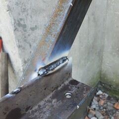 Close-up of Metal Welding Seam on Steel Construction Frame