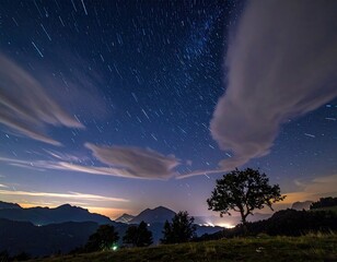 Star trails over a mountain landscape