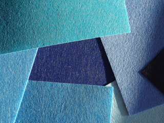 The textured surface is blue as a background. Felt. High quality photo
