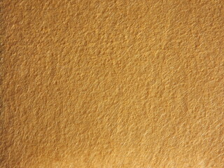 The textured surface is brown, red in color as a background. Felt. High quality photo