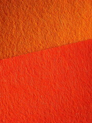 Orange background with structured surface imitation felt. High quality photo