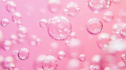 Pink soap bubbles floating in the air