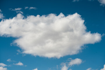 Fluffy White Cloud Against Blue Sky