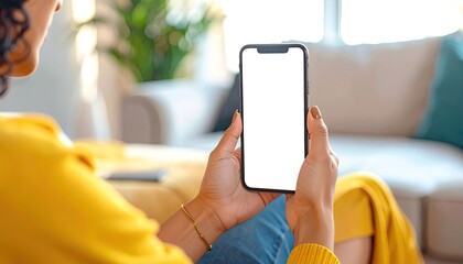 Woman holding smartphone with blank screen (1)