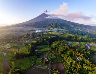Aerial view of volcano with village and farms
