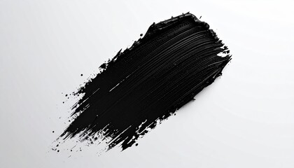 Black cosmetic smear on white background