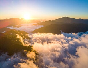 Sunrise over misty mountain range