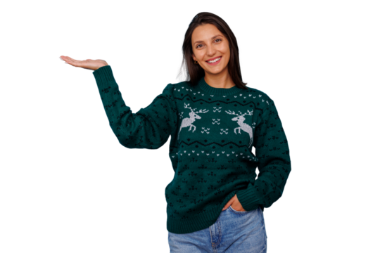 Smiling woman in christmas sweater showing open palm, presenting product or invisible object, transparent background