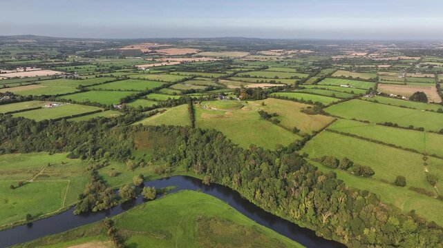 River Boyne, green valley and Knowth monument. Green fields, Ireland rural landscape. Drone aerial