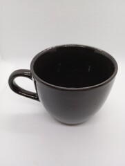 black cup of coffee on white background