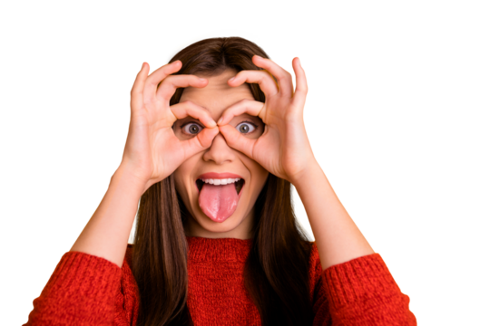 Back to childhood concept. Close up photo of funny funky hipster lady show ok sign make binoculars from fingers look with tongue out have fun fooling wear red sweater isolated yellow color background