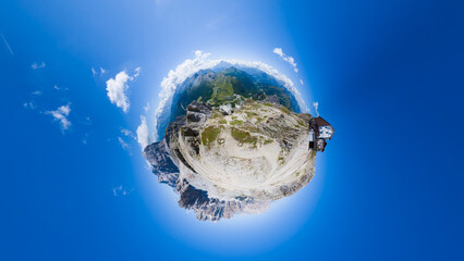 Fototapeta premium Hiking at Passo Falzarego - Cortina d'Ampezzo - Italy - Tiny planet