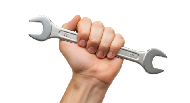 Isolated hand holding spanner wrench or repair tool for plumbing and engineering projects