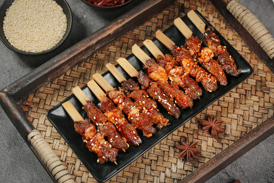 Grilled Beef Skewers with Sesame Seeds on Bamboo Sticks - Traditional Asian Barbecue Food
