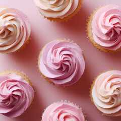 Pink Cupcakes with Cream Swirl Frosting, Top View on Pink Background
