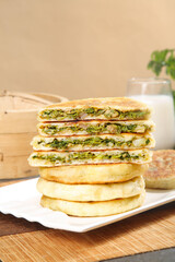 Savory Herb Cheese Puff Pastry Stack with Fresh Milk on Rustic Wooden Board