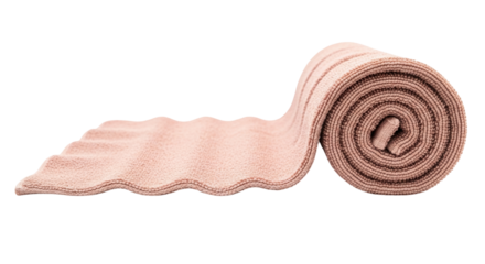 Isolated tan-colored elastic bandage rolled up, for compression and support, first aid supply