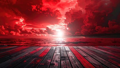 Dramatic red sunset over a wooden boardwalk