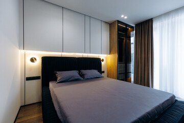 Explore the Modern Minimalist Bedroom Design, featuring Stylish Accents that enhance the space