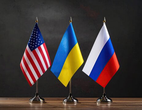 Three national flags ? USA, Ukraine, and Russia ? on stands, dark background