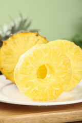Fresh Golden Pineapple Slices with Sweet Juicy Flesh on White Plate - Tropical Fruit