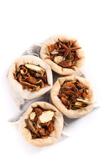 Dried Spices and Seasonings Collection in Paper Bags - Star Anise, Cinnamon, Chili Peppers and Aromatic Herbs