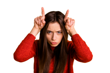 Photo of frowning sullen disappointed disobedient girl showing you bull horns isolated over vivid color background