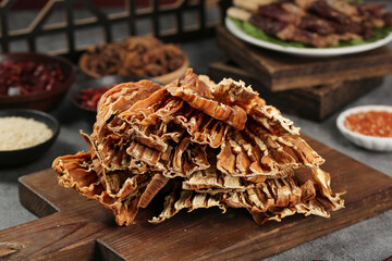 Dried Bamboo Shoots on Wooden Board - Traditional Asian Cooking Ingredients in Rustic Farmhouse Kitchen Setting