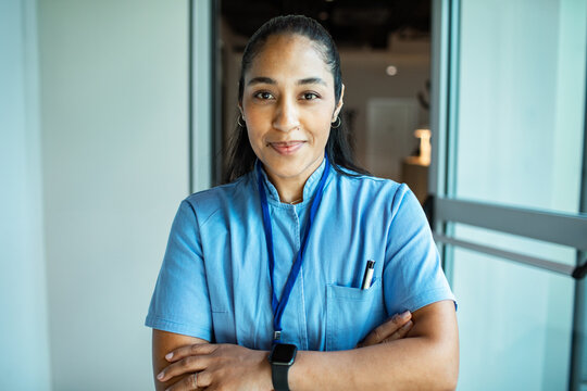 Healthcare professional in blue scrubs