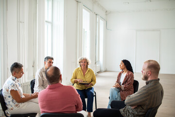 Group discussion in bright room
