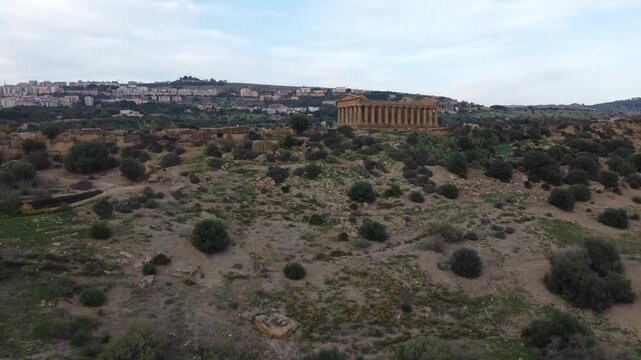Drone footage of Valle dei Templi in Agrigento, Sicily, highlighting the Temple of Concordia, Temple of Juno, Temple of Heracles, Temple of Olympian Zeus, and Castor and Pollux.