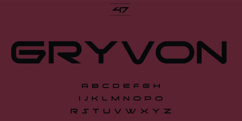 Modern sans serif font gryvon displayed with alphabet characters on a dark red background