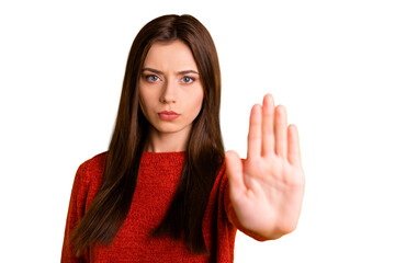 Photo of cute serious confident woman showing you her hand palm for you to stop movement isolated...