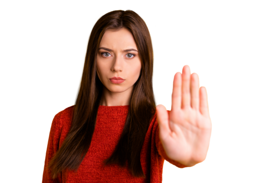 Photo of cute serious confident woman showing you her hand palm for you to stop movement isolated over yellow vivid color background