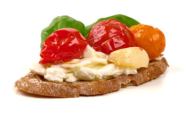 Bruschetta with Tomatoes, Mozzarella and Basil, isolated on white background