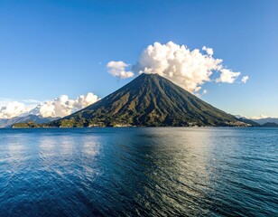 Volcanic peak rising above a tranquil lake