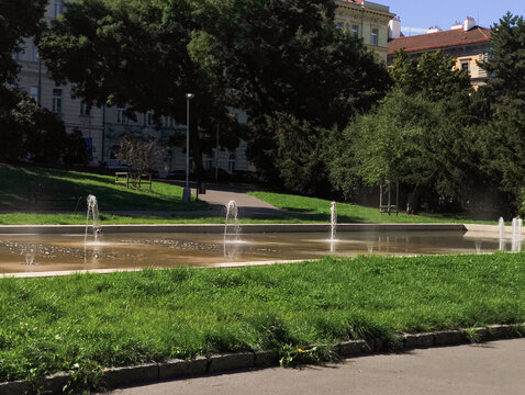 Fountains sprinkling water in park Sady Svatopluka Cecha in prague