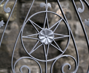 A close-up of a beautiful forged fence